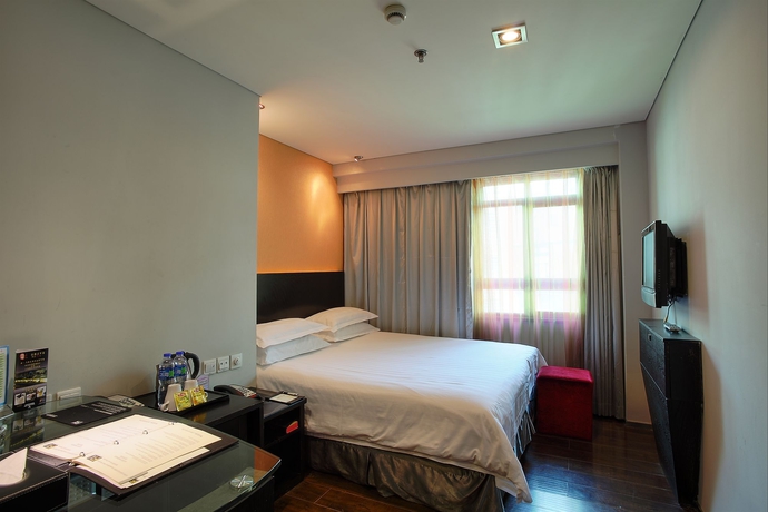Imagen de la habitación del Hotel Fx Xujiahui. Foto 2