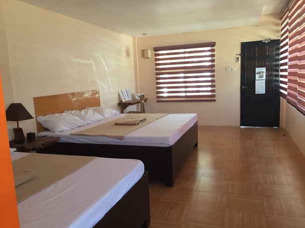 Imagen de la habitación del Hotel G Beach Resort and Restobar. Foto 2