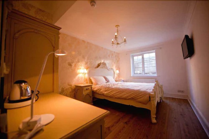 Imagen de la habitación del Hotel G Boutique. Foto 10
