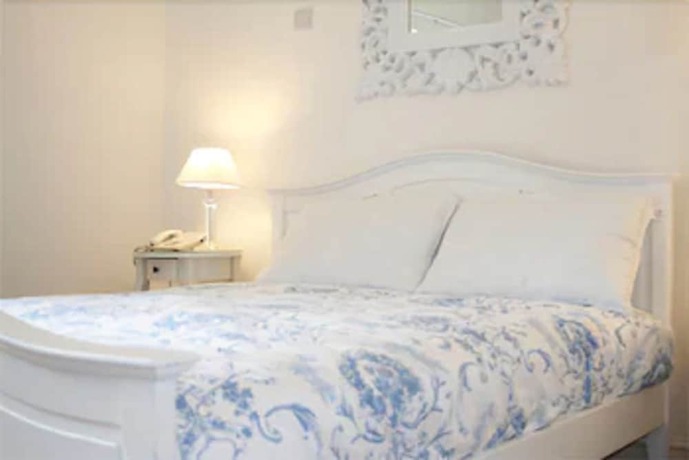 Imagen de la habitación del Hotel G Boutique. Foto 11