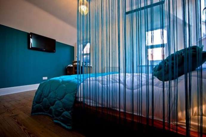 Imagen de la habitación del Hotel G Boutique. Foto 13