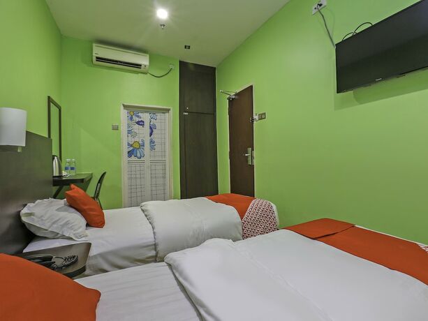 Imagen de la habitación del Hotel G Home Hotel. Foto 3