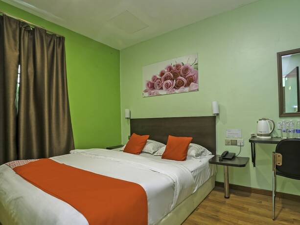 Imagen de la habitación del Hotel G Home Hotel. Foto 9