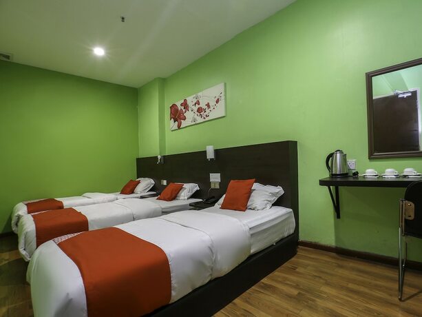 Imagen de la habitación del Hotel G Home Hotel. Foto 13