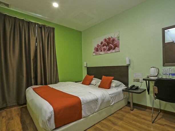 Imagen de la habitación del Hotel G Home Hotel. Foto 15