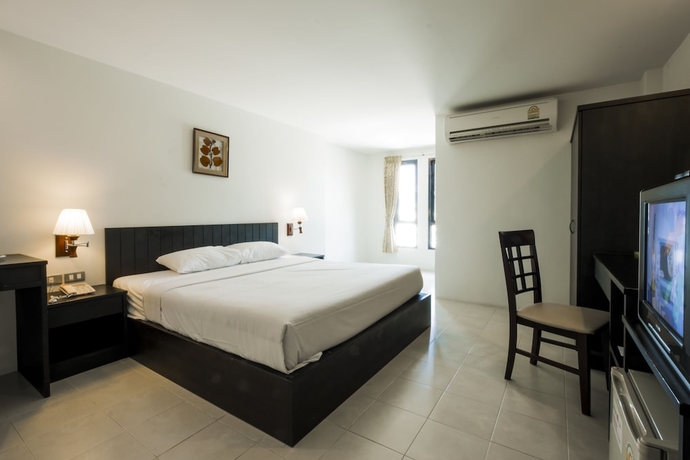Imagen de la habitación del Hotel G House. Foto 8
