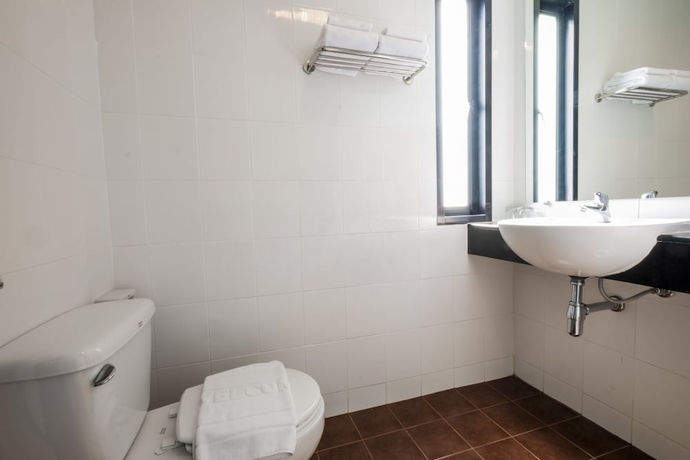 Imagen de la habitación del Hotel G House. Foto 17