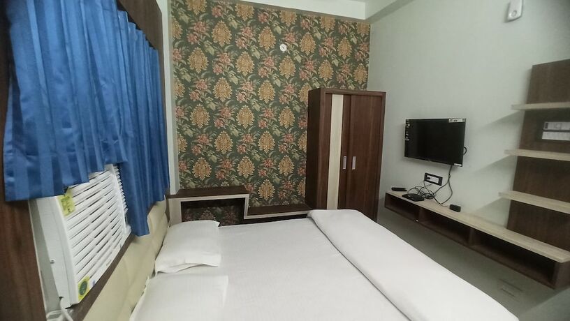 Imagen de la habitación del Hotel G P Guest House And Banquet Hall. Foto 10