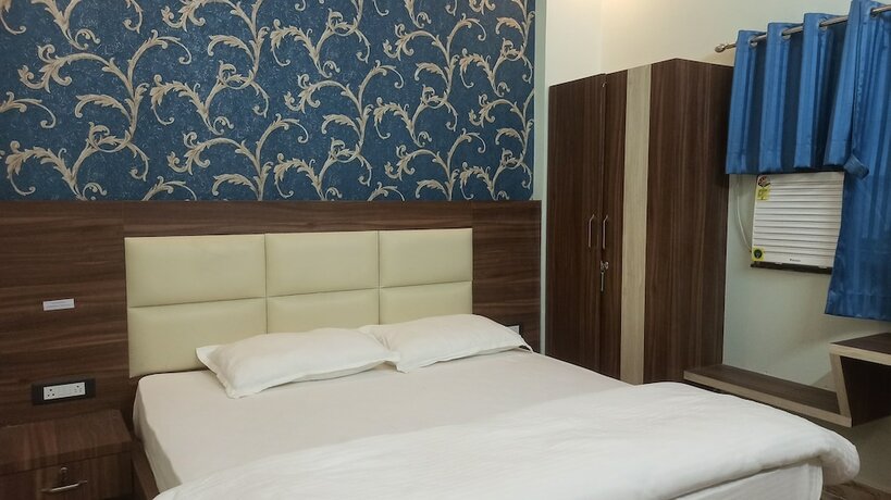 Imagen de la habitación del Hotel G P Guest House And Banquet Hall. Foto 21