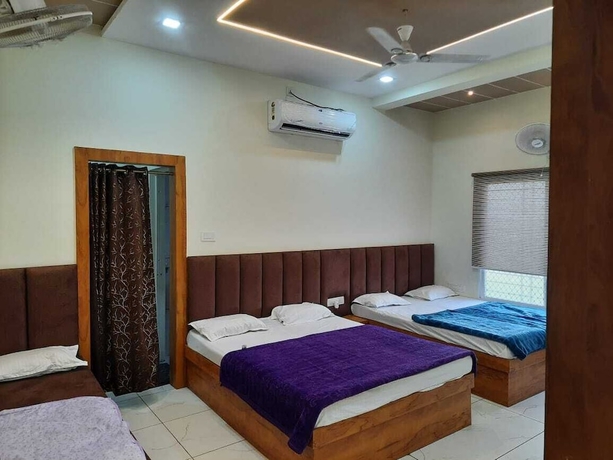 Imagen de la habitación del Hotel G R Inn near Temple and Rail Station. Foto 2