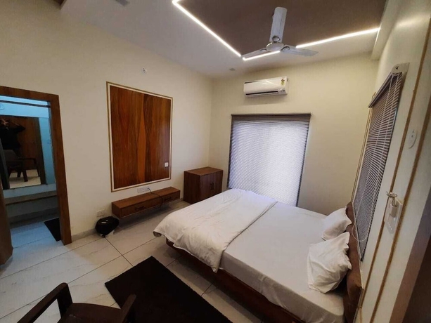 Imagen de la habitación del Hotel G R Inn near Temple and Rail Station. Foto 4