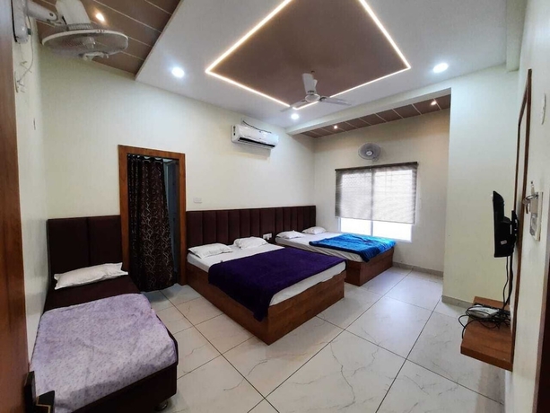 Imagen de la habitación del Hotel G R Inn near Temple and Rail Station. Foto 5
