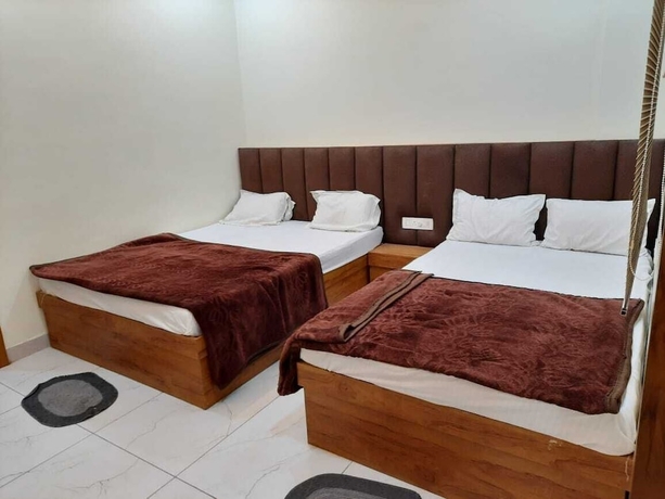 Imagen de la habitación del Hotel G R Inn near Temple and Rail Station. Foto 7