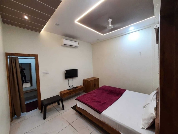Imagen de la habitación del Hotel G R Inn near Temple and Rail Station. Foto 9