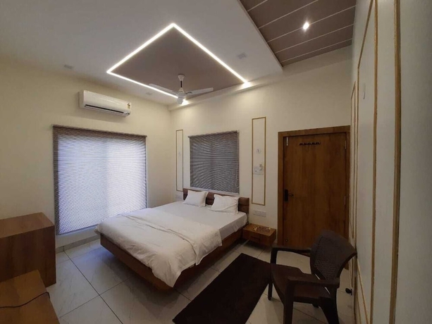 Imagen de la habitación del Hotel G R Inn near Temple and Rail Station. Foto 11