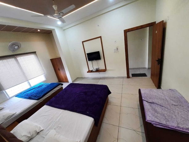 Imagen de la habitación del Hotel G R Inn near Temple and Rail Station. Foto 12