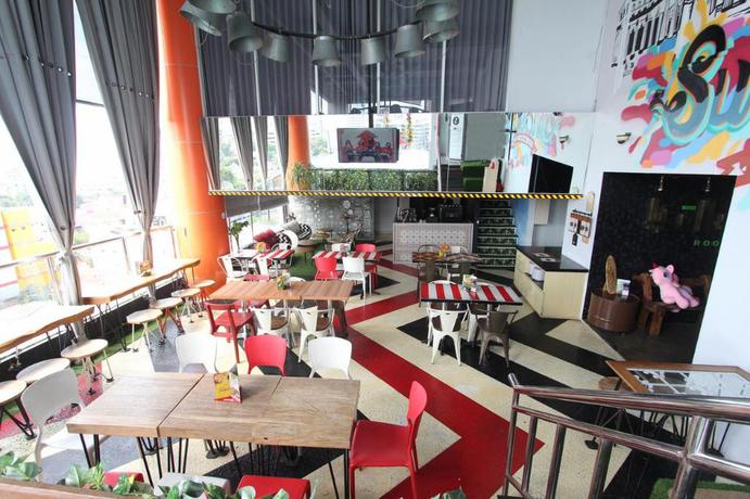 Imagen del bar/restaurante del Hotel G Suites By Amithya. Foto 5