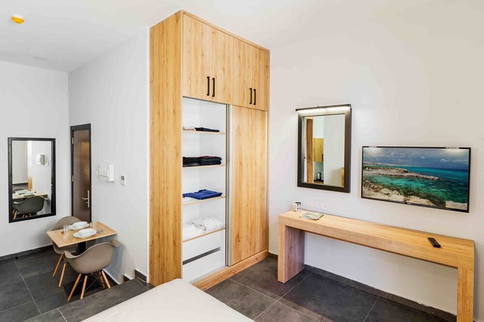 Imagen de la habitación del Hotel G Suites Luxury Rentals. Foto 12