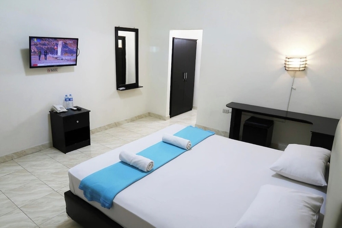 Imagen de la habitación del Hotel G Syariah Bandar Lampung. Foto 3