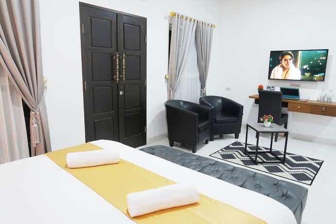 Imagen de la habitación del Hotel G Syariah Bandar Lampung. Foto 5