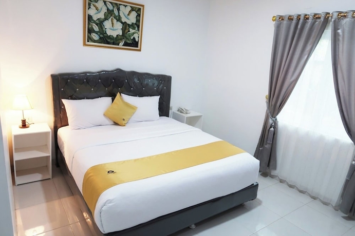 Imagen de la habitación del Hotel G Syariah Bandar Lampung. Foto 6