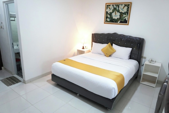 Imagen de la habitación del Hotel G Syariah Bandar Lampung. Foto 7