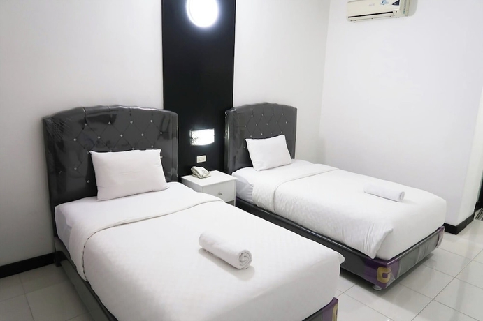 Imagen de la habitación del Hotel G Syariah Bandar Lampung. Foto 10