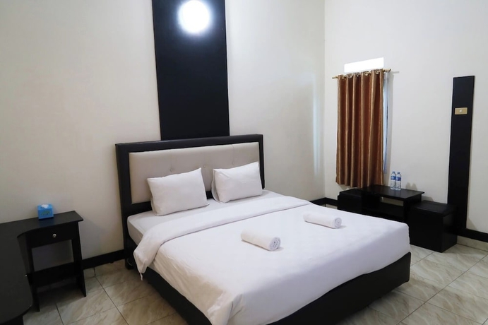 Imagen de la habitación del Hotel G Syariah Bandar Lampung. Foto 12
