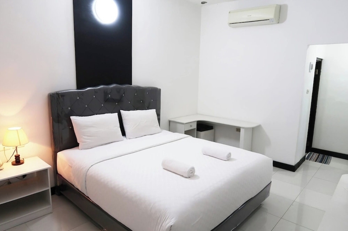 Imagen de la habitación del Hotel G Syariah Bandar Lampung. Foto 13