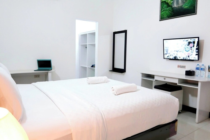 Imagen de la habitación del Hotel G Syariah Bandar Lampung. Foto 14