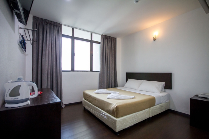 Imagen de la habitación del Hotel G Times Inn. Foto 1