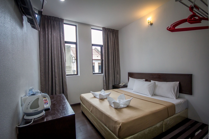 Imagen de la habitación del Hotel G Times Inn. Foto 3