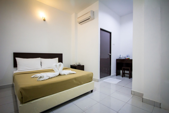 Imagen de la habitación del Hotel G Times Inn. Foto 7