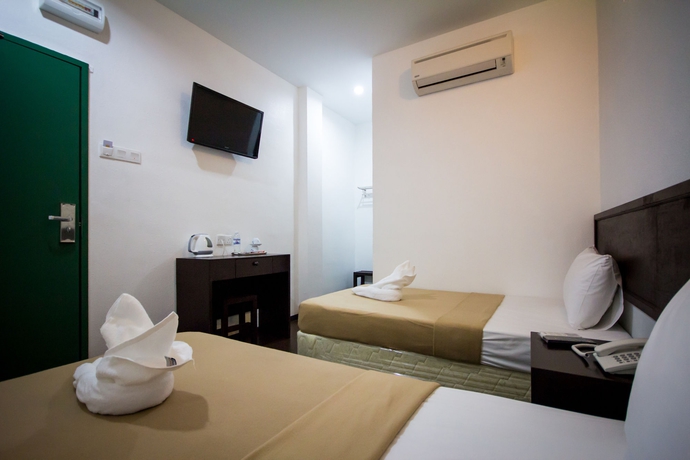 Imagen de la habitación del Hotel G Times Inn. Foto 8