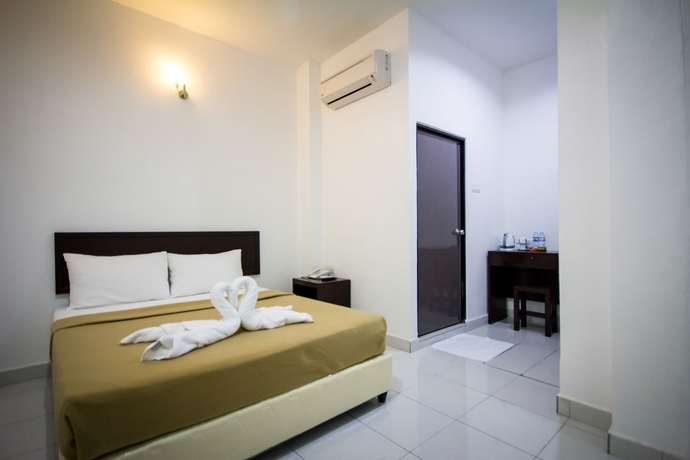 Imagen de la habitación del Hotel G Times Inn. Foto 9