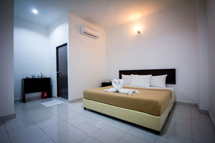 Imagen de la habitación del Hotel G Times Inn. Foto 10