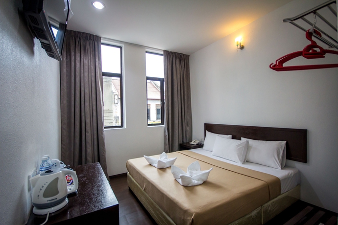 Imagen de la habitación del Hotel G Times Inn. Foto 11