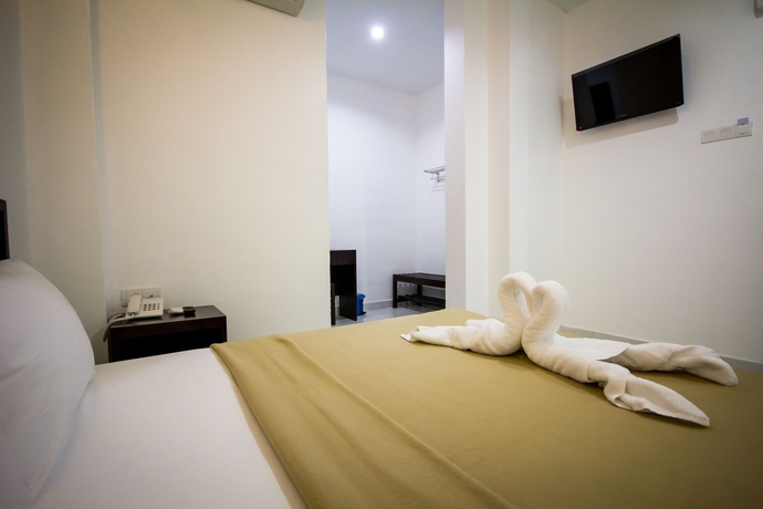 Imagen de la habitación del Hotel G Times Inn. Foto 12