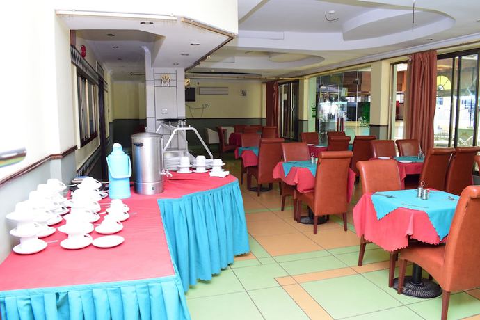 Imagen del bar/restaurante del Hotel G and G Ltd. Foto 8