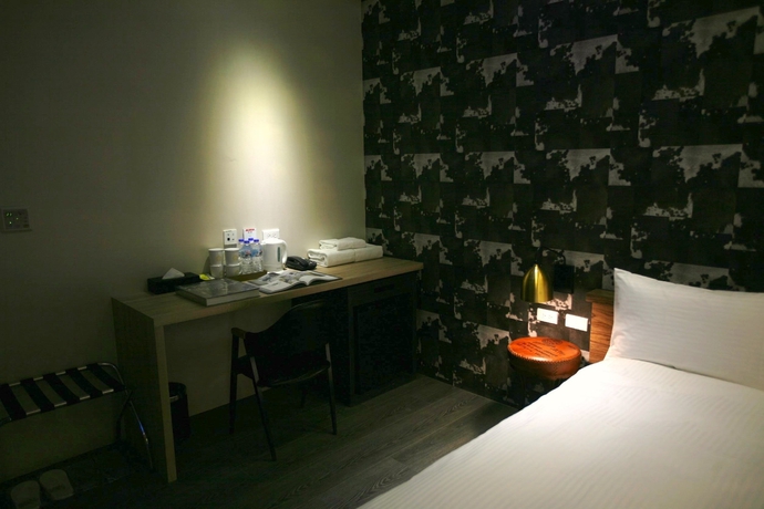Imagen de la habitación del Hotel G11. Foto 12