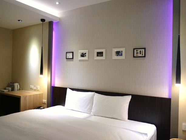 Imagen de la habitación del Hotel G11. Foto 13