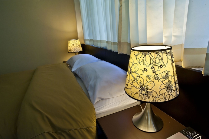 Imagen de la habitación del Hotel G9 Bangkok. Foto 8