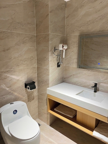 Imagen de la habitación del Hotel GARDEN PHOENIX HOTEL. Foto 11