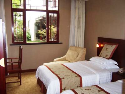 Imagen de la habitación del Hotel GARDEN VIEW, Suzhou. Foto 7