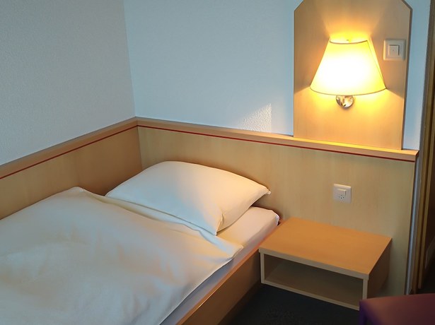 Imagen de la habitación del Hotel GARNI Mittenwald. Foto 11