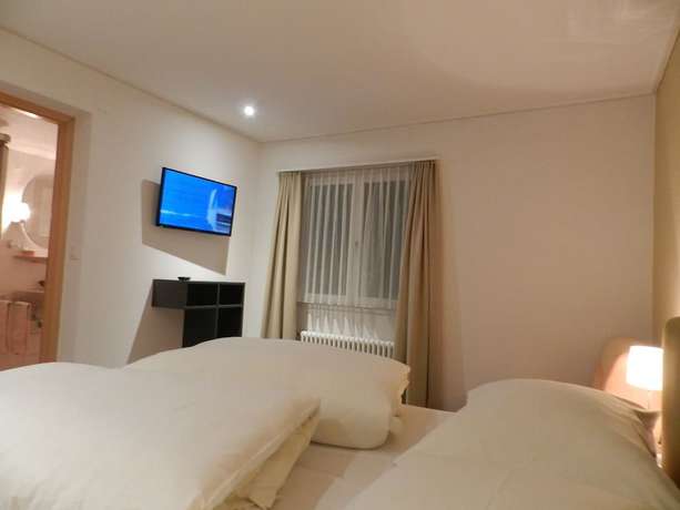 Imagen de la habitación del Hotel GARNI Mittenwald. Foto 12