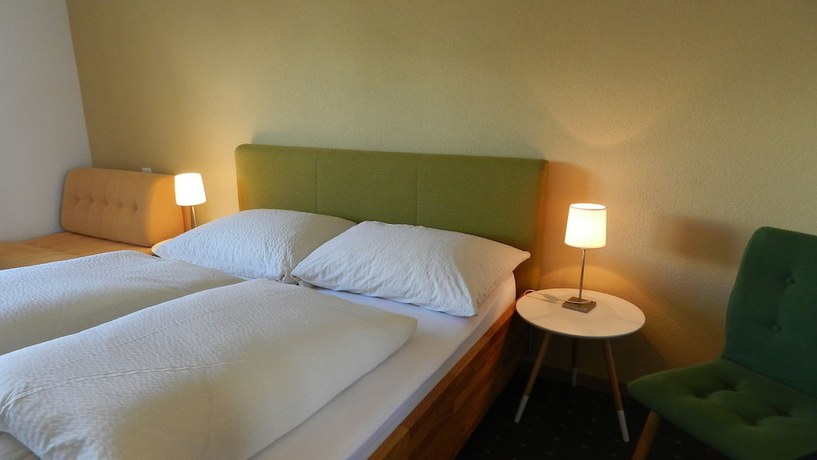 Imagen de la habitación del Hotel GARNI Mittenwald. Foto 13