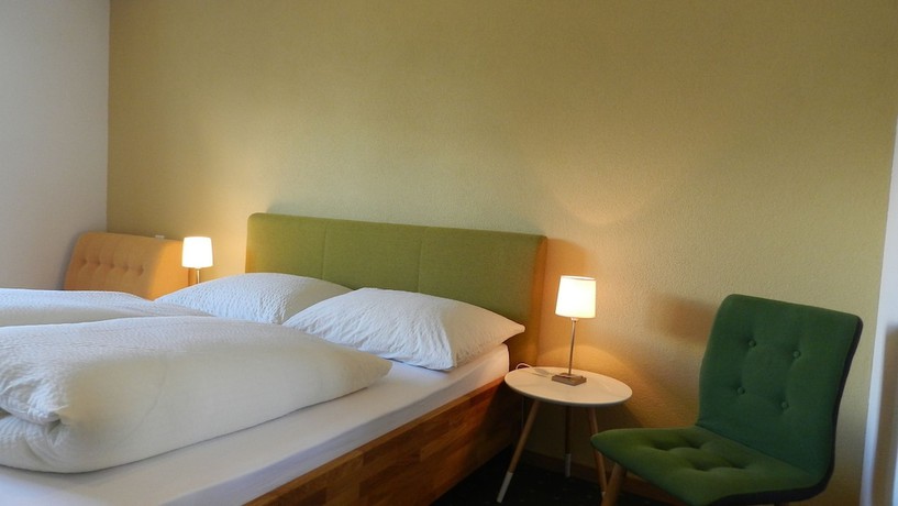 Imagen de la habitación del Hotel GARNI Mittenwald. Foto 14