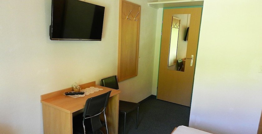 Imagen de la habitación del Hotel GARNI Mittenwald. Foto 15