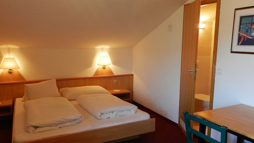 Imagen de la habitación del Hotel GARNI Mittenwald. Foto 18